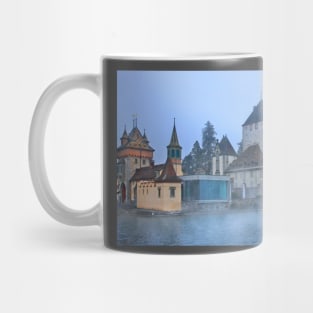 Oberhofen castle floating in the mist Mug